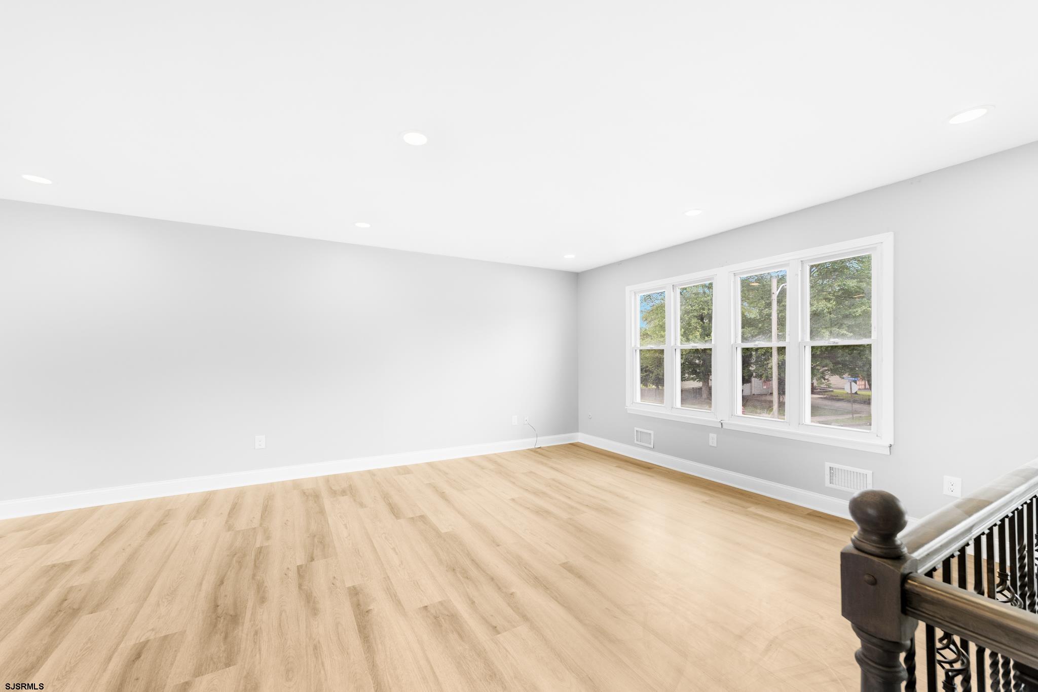 243 Wintergreen Lane Penns Grove, NJ 08069 - Photo 4 of 32 a view of an empty room with a window