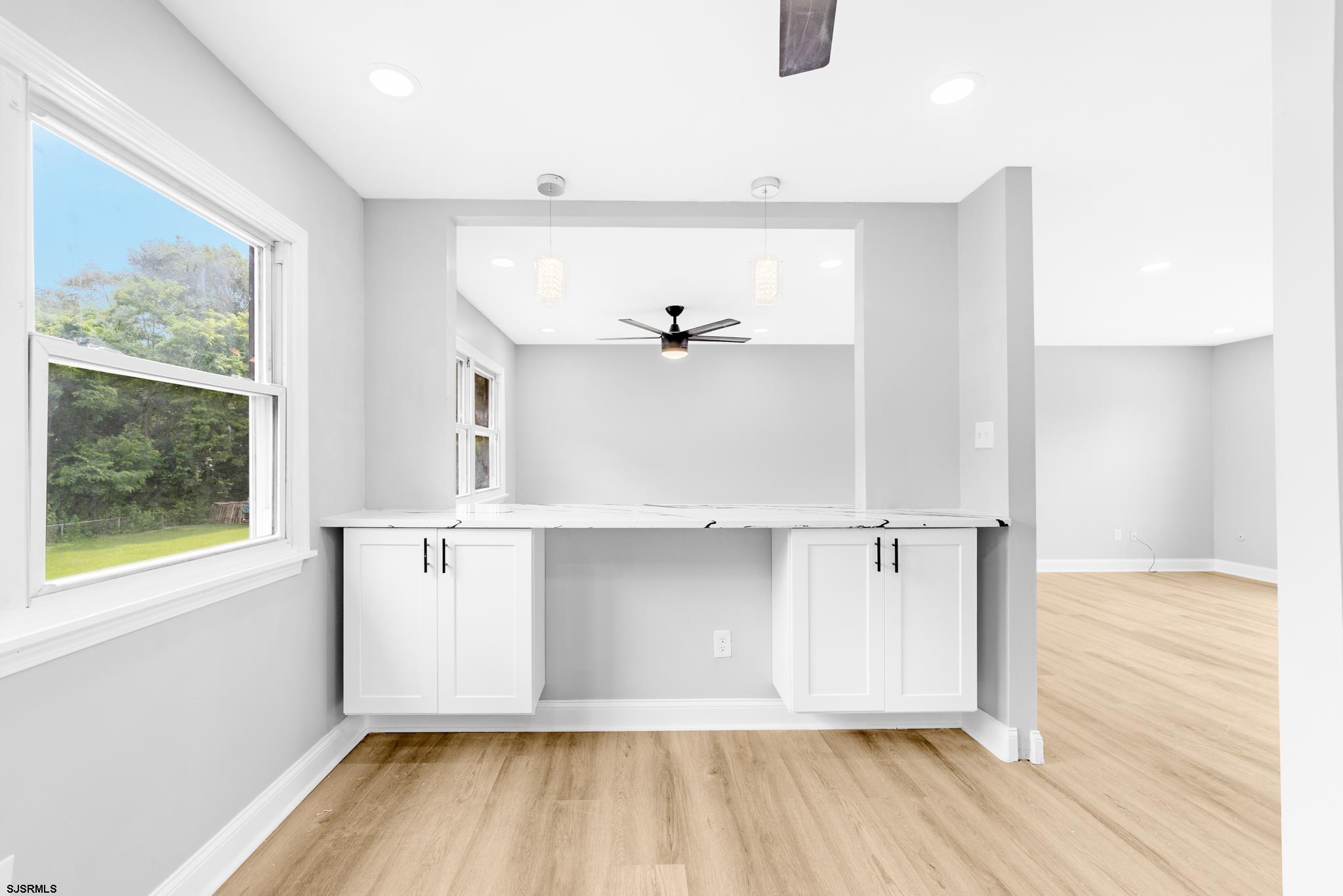 243 Wintergreen Lane Penns Grove, NJ 08069 - Photo 9 of 32 a view of a room with wooden floor and cabinet