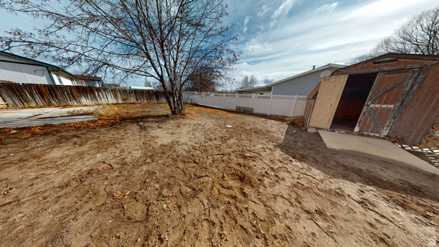 1348 Sagewood Road Price, UT 84501 - Photo 34 of 34 Fenced backyard with a shed
