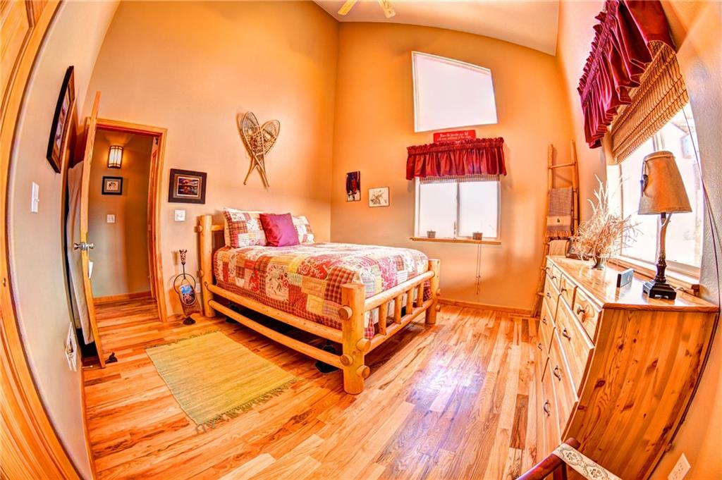108 Australian Road Como, CO 80456 - Photo 17 of 25 a bedroom with a bed and a window