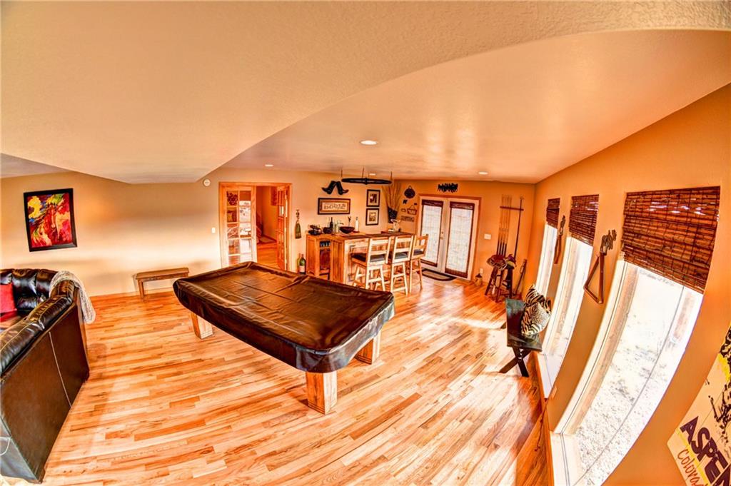 108 Australian Road Como, CO 80456 - Photo 18 of 25 a living room with furniture a flat screen tv and a table