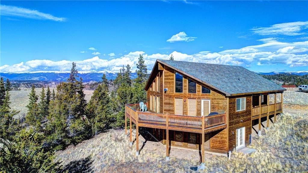 108 Australian Road Como, CO 80456 - Photo 3 of 25 a house view with a sitting space and garden