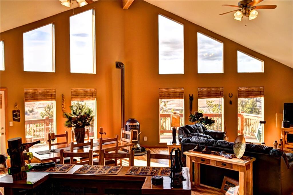 108 Australian Road Como, CO 80456 - Photo 6 of 25 a view of a living room and dining room