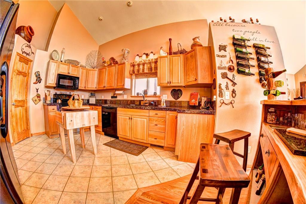 108 Australian Road Como, CO 80456 - Photo 9 of 25 a building with glass top table and chairs