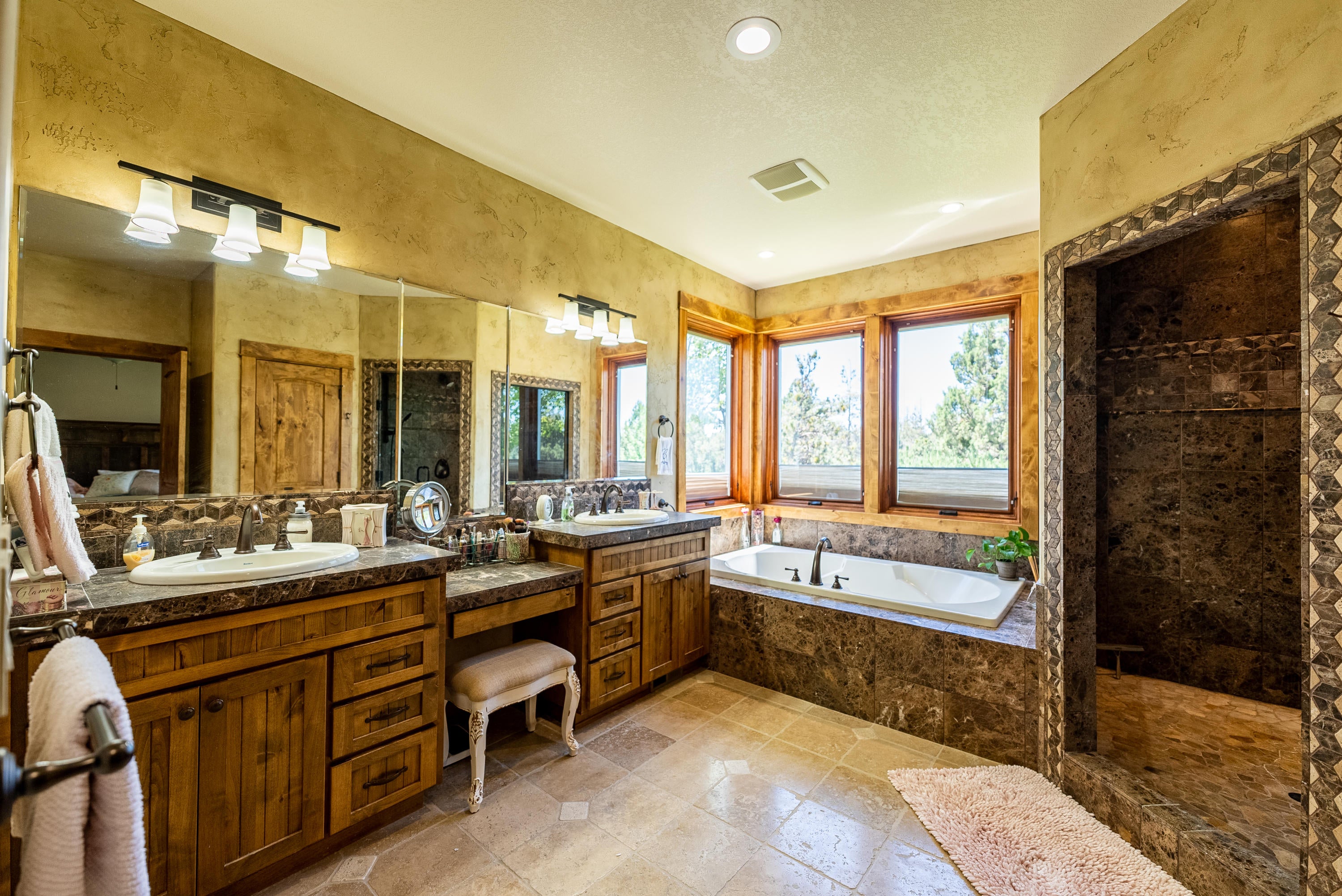 63545 Overtree Road Bend, OR 97701 - Photo 30 of 63 master bathroom with immense natural light is private and inviting