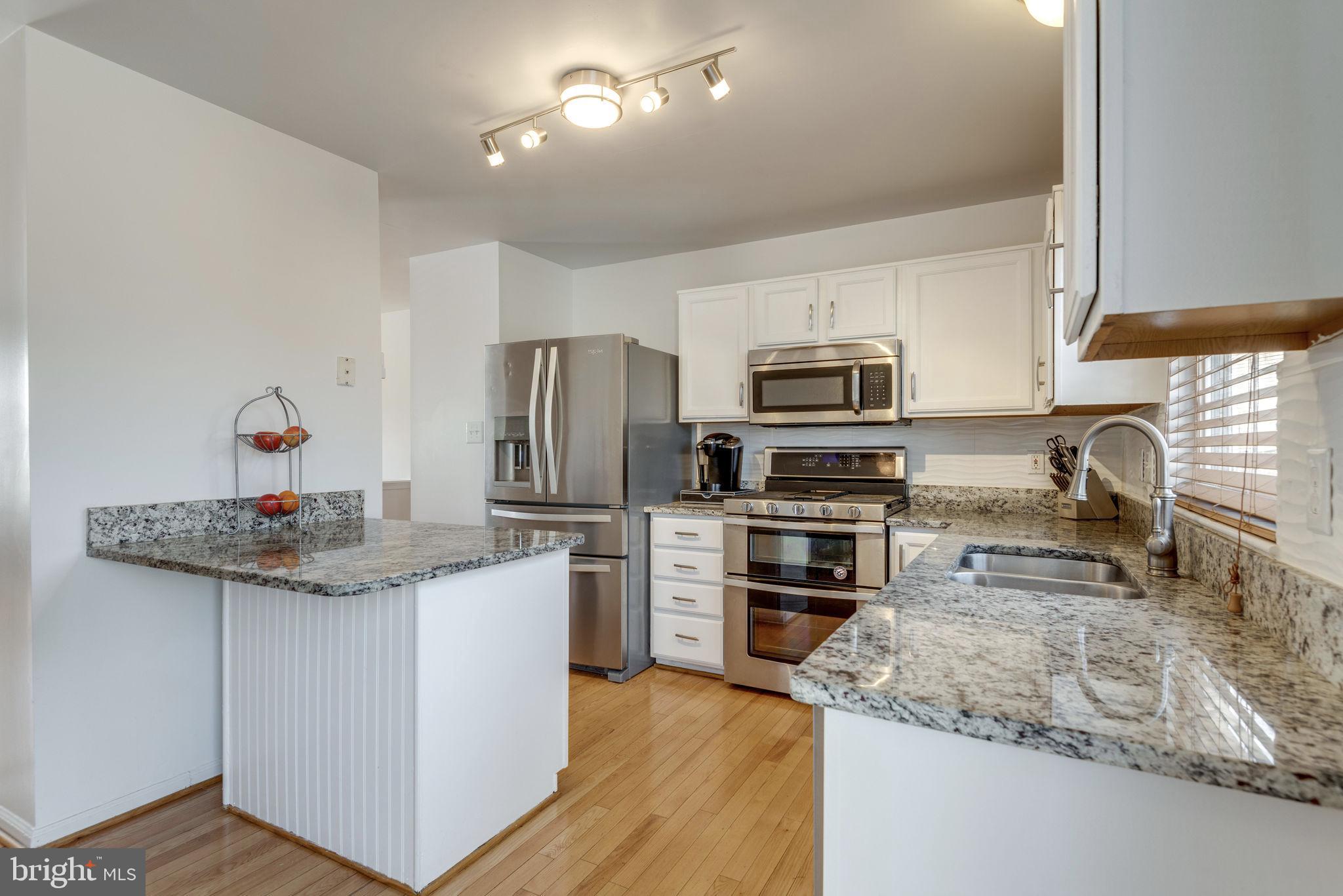 20717 Cross Timber Drive Ashburn, VA 20147 - Photo 9 of 31 Kitchen