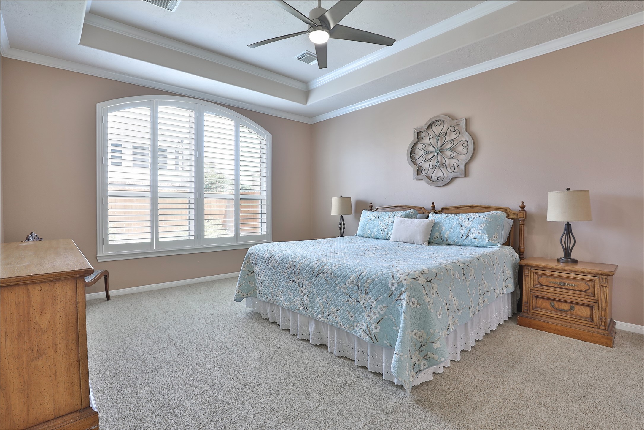 20519 Windrose Bend Drive Spring, TX 77379 - Photo 20 of 37 The owner's suite is conveniently situated apart from the secondary bedrooms; it is both spacious and inviting, and features a private en suite bathroom.