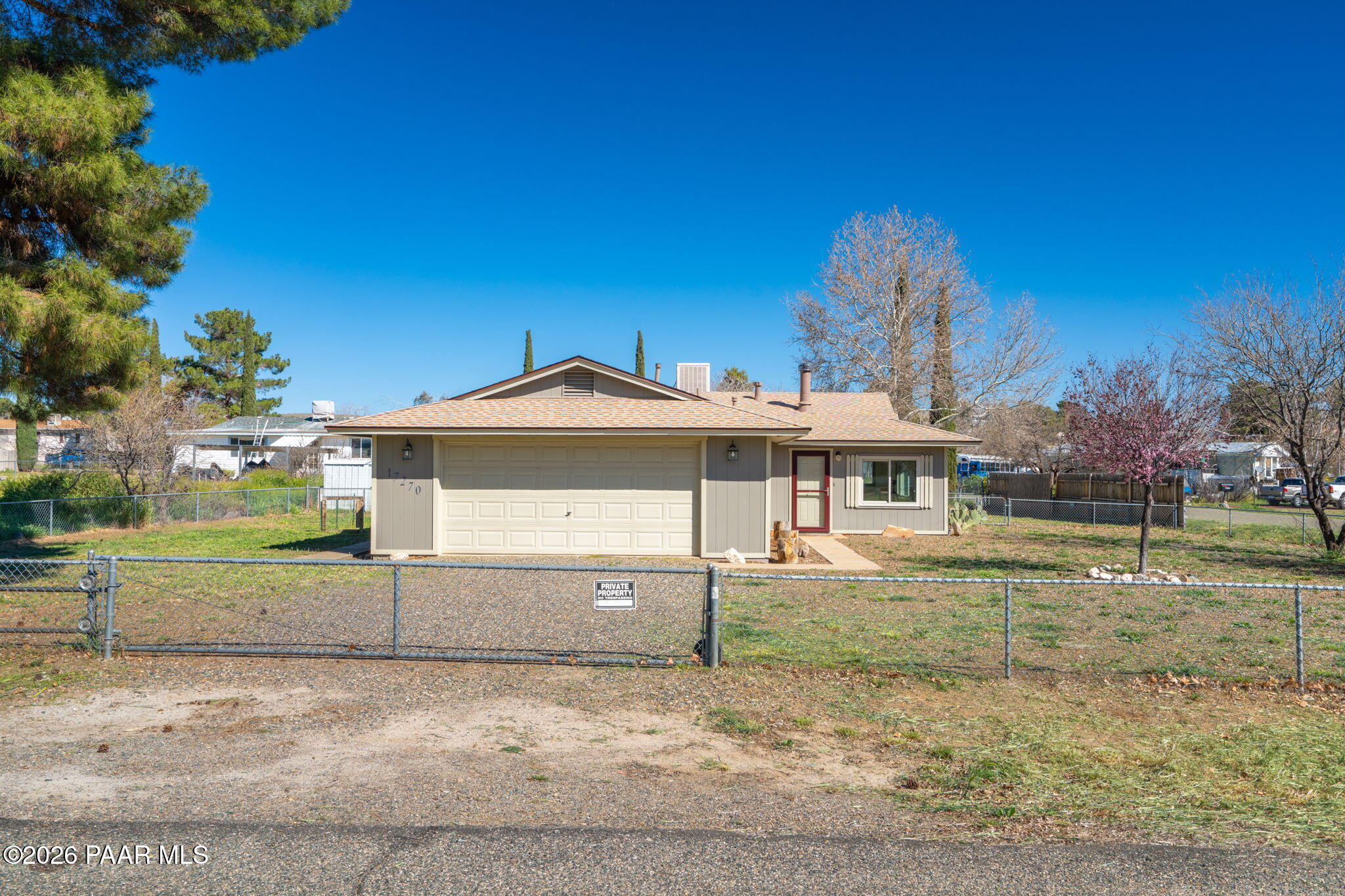 17270 East Peach Tree Road Mayer, AZ 86333 - Photo 21 of 31 a front view of a house with a yard