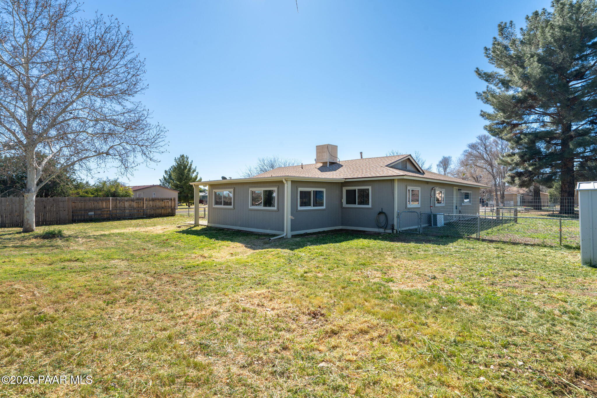 17270 East Peach Tree Road Mayer, AZ 86333 - Photo 22 of 31 a front view of a house with a yard