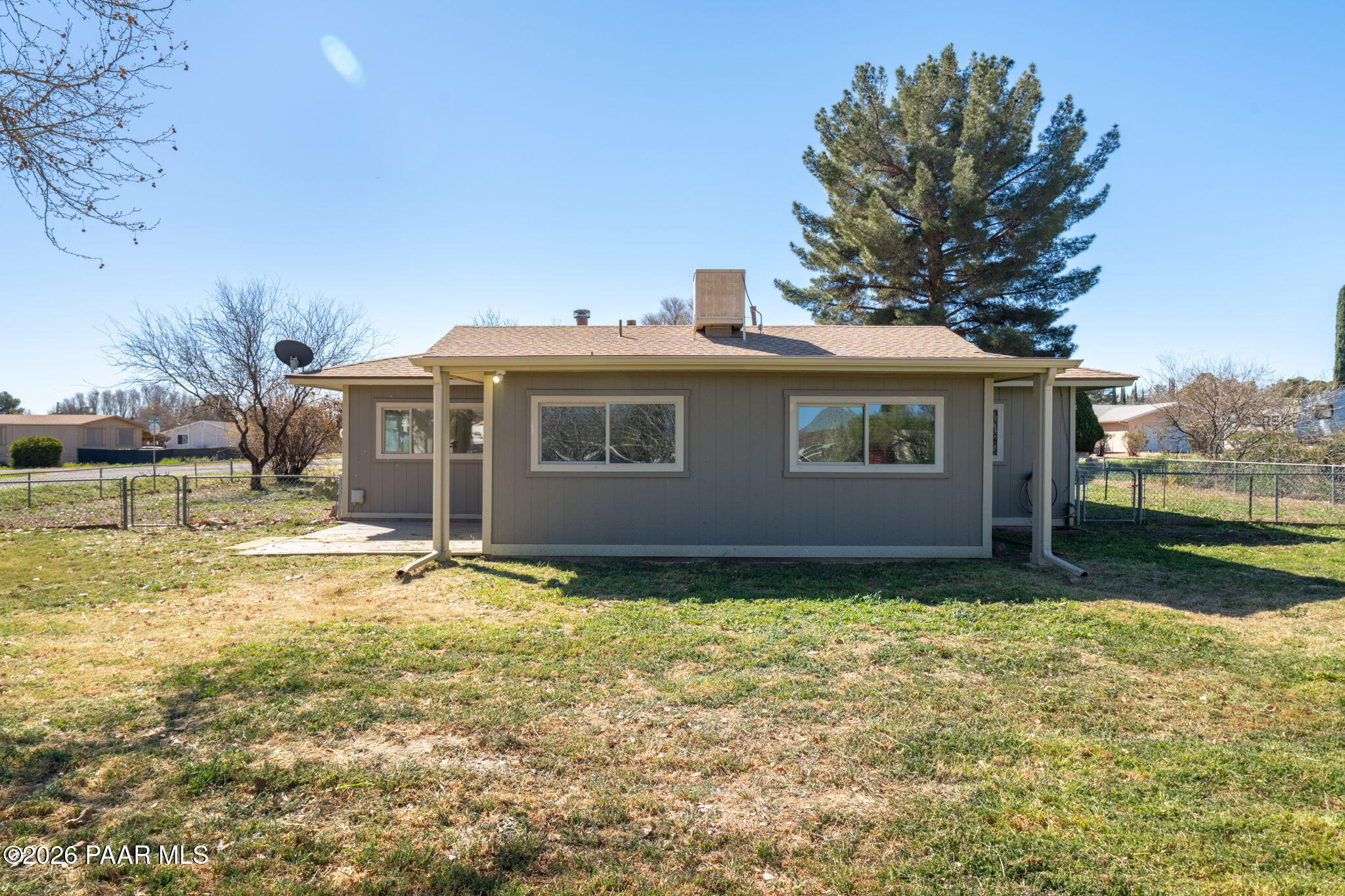17270 East Peach Tree Road Mayer, AZ 86333 - Photo 27 of 31 a view of a house with a yard