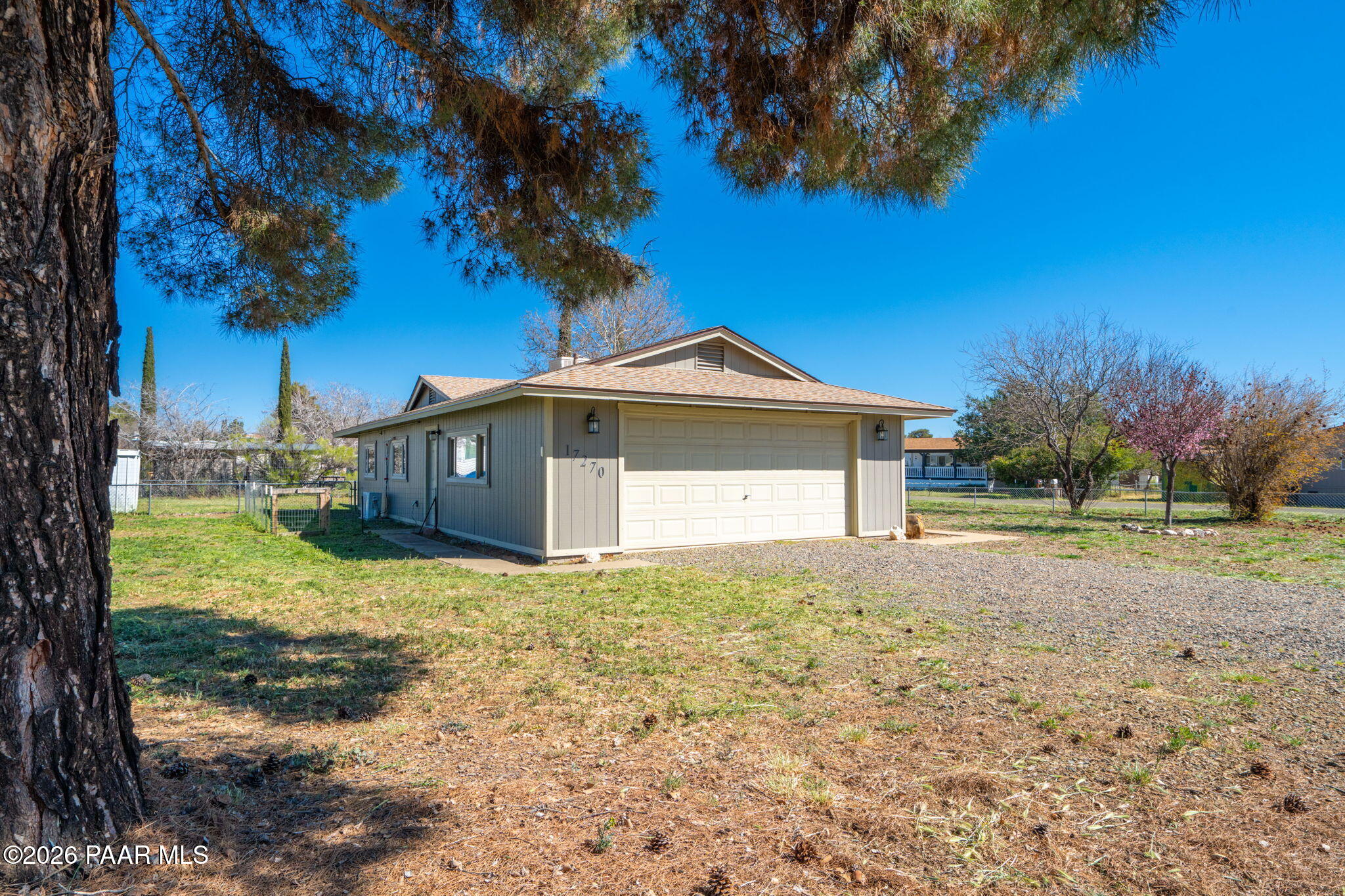 17270 East Peach Tree Road Mayer, AZ 86333 - Photo 28 of 31 a view of a house with a yard