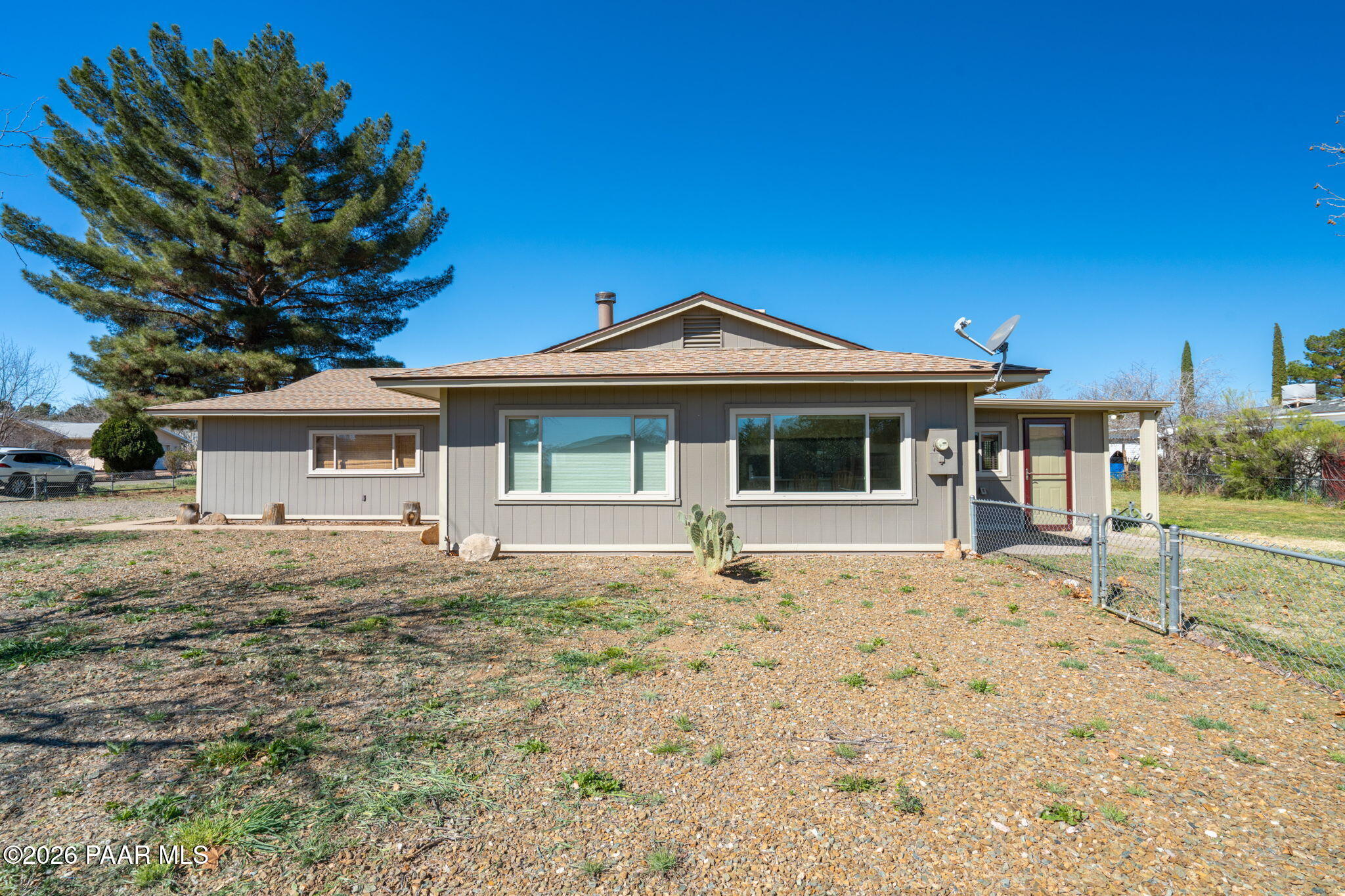17270 East Peach Tree Road Mayer, AZ 86333 - Photo 29 of 31 a front view of a house with a garden