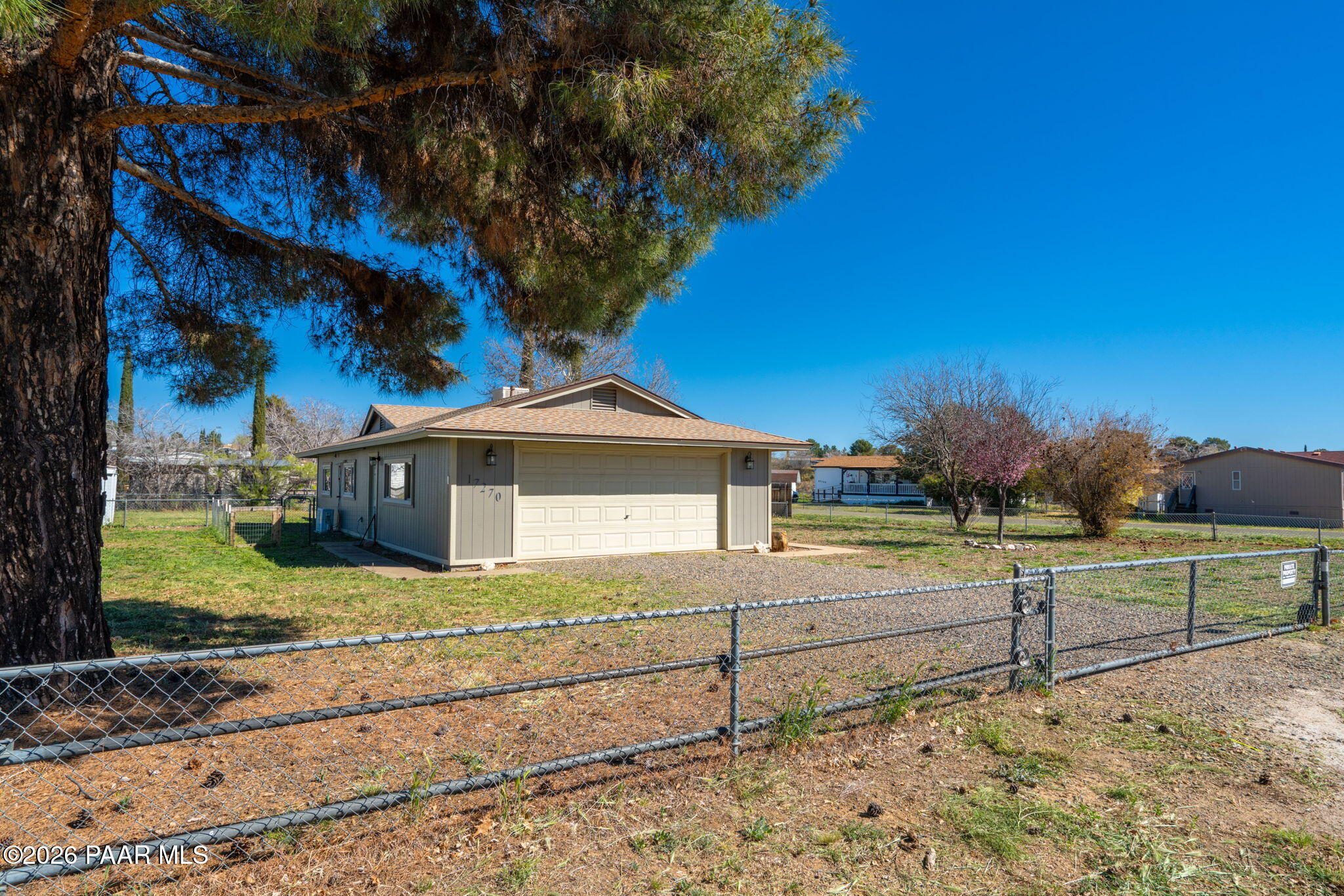17270 East Peach Tree Road Mayer, AZ 86333 - Photo 30 of 31 a view of a house with a yard