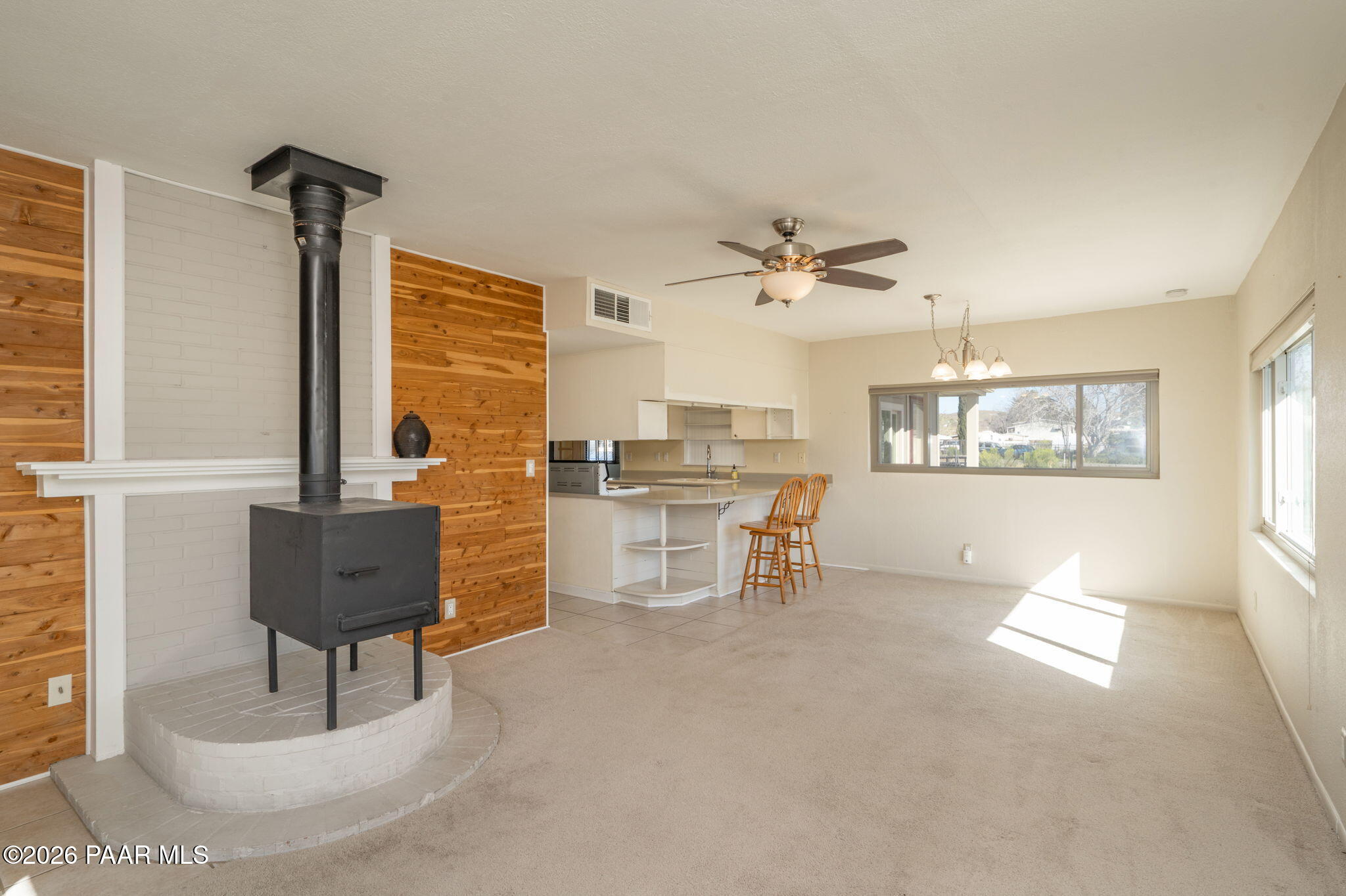 17270 East Peach Tree Road Mayer, AZ 86333 - Photo 4 of 31 a view of an empty room with a window