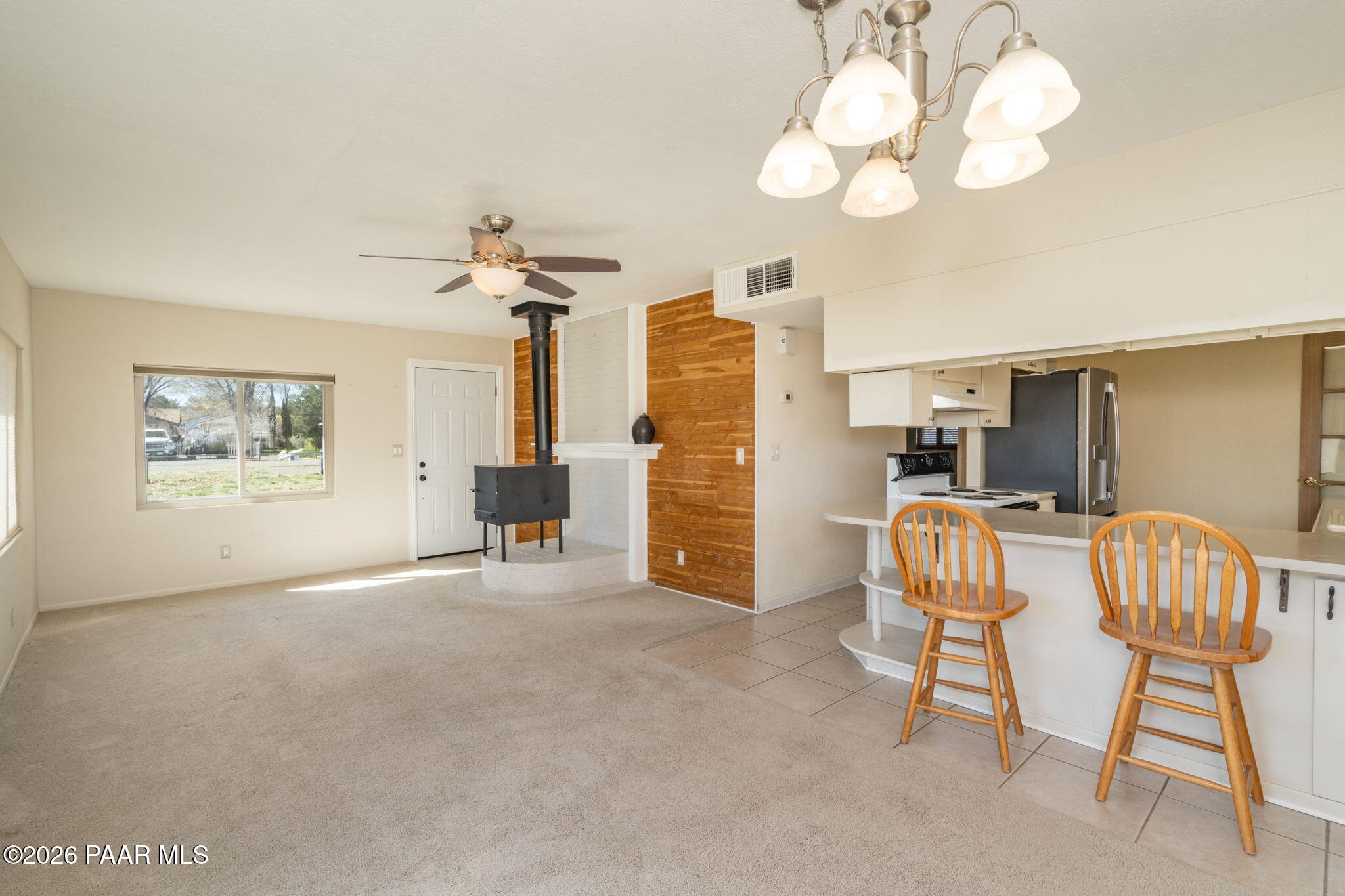 17270 East Peach Tree Road Mayer, AZ 86333 - Photo 5 of 31 a view of a livingroom with furniture and a chandelier