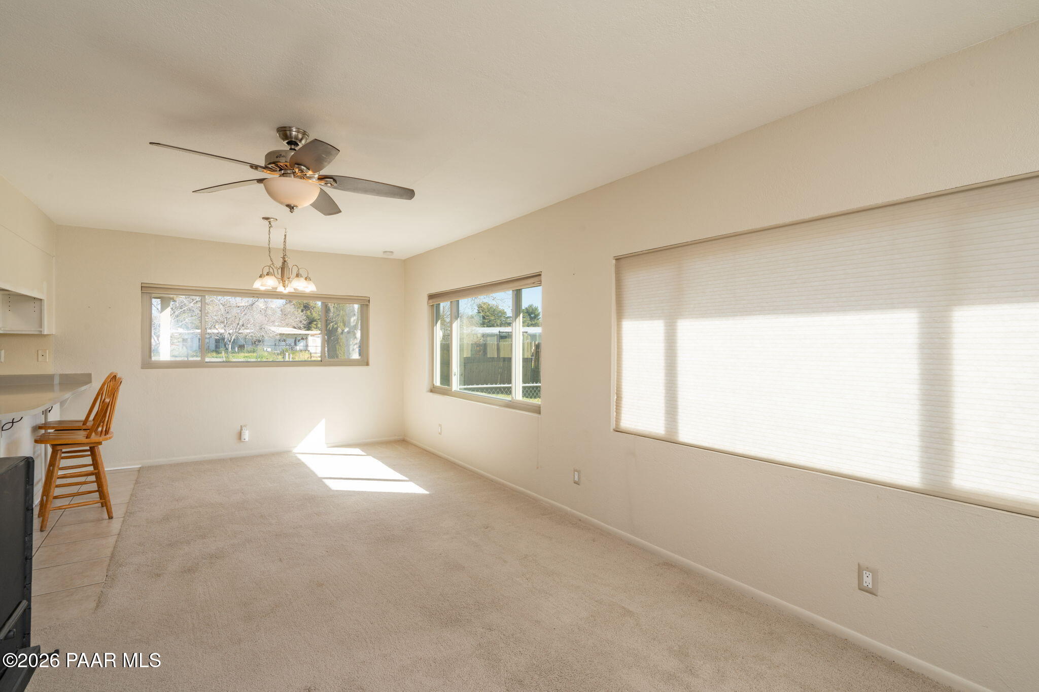 17270 East Peach Tree Road Mayer, AZ 86333 - Photo 6 of 31 a view of an empty room with a window
