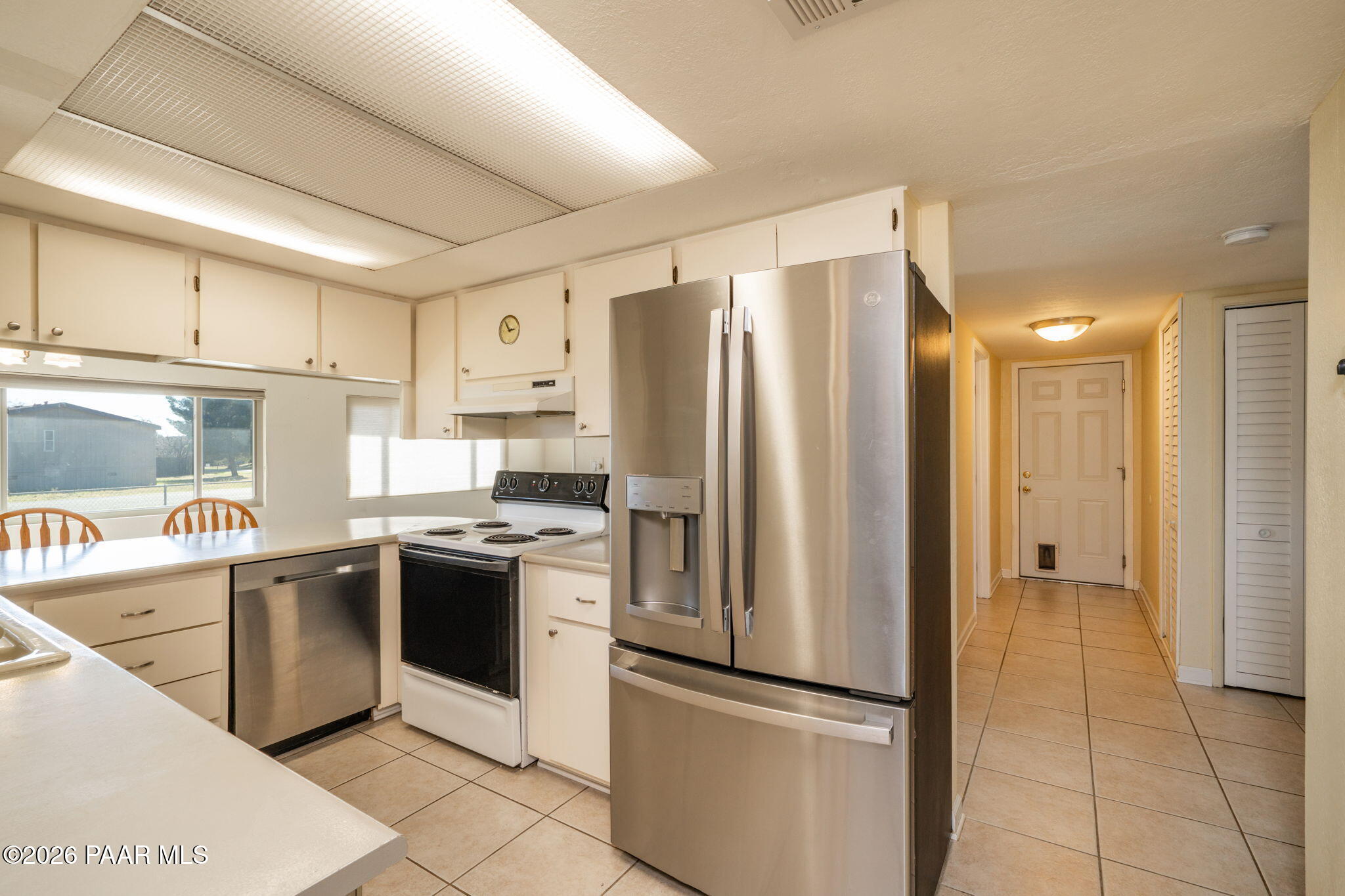 17270 East Peach Tree Road Mayer, AZ 86333 - Photo 8 of 31 a kitchen with stainless steel appliances granite countertop a refrigerator and a sink