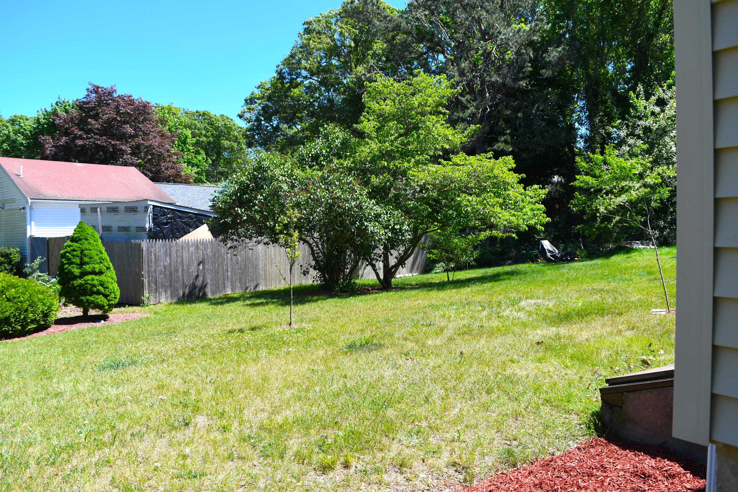 14 Marilyn Road Buzzards Bay, MA 02532 - Photo 3 of 20 a view of a backyard with a garden