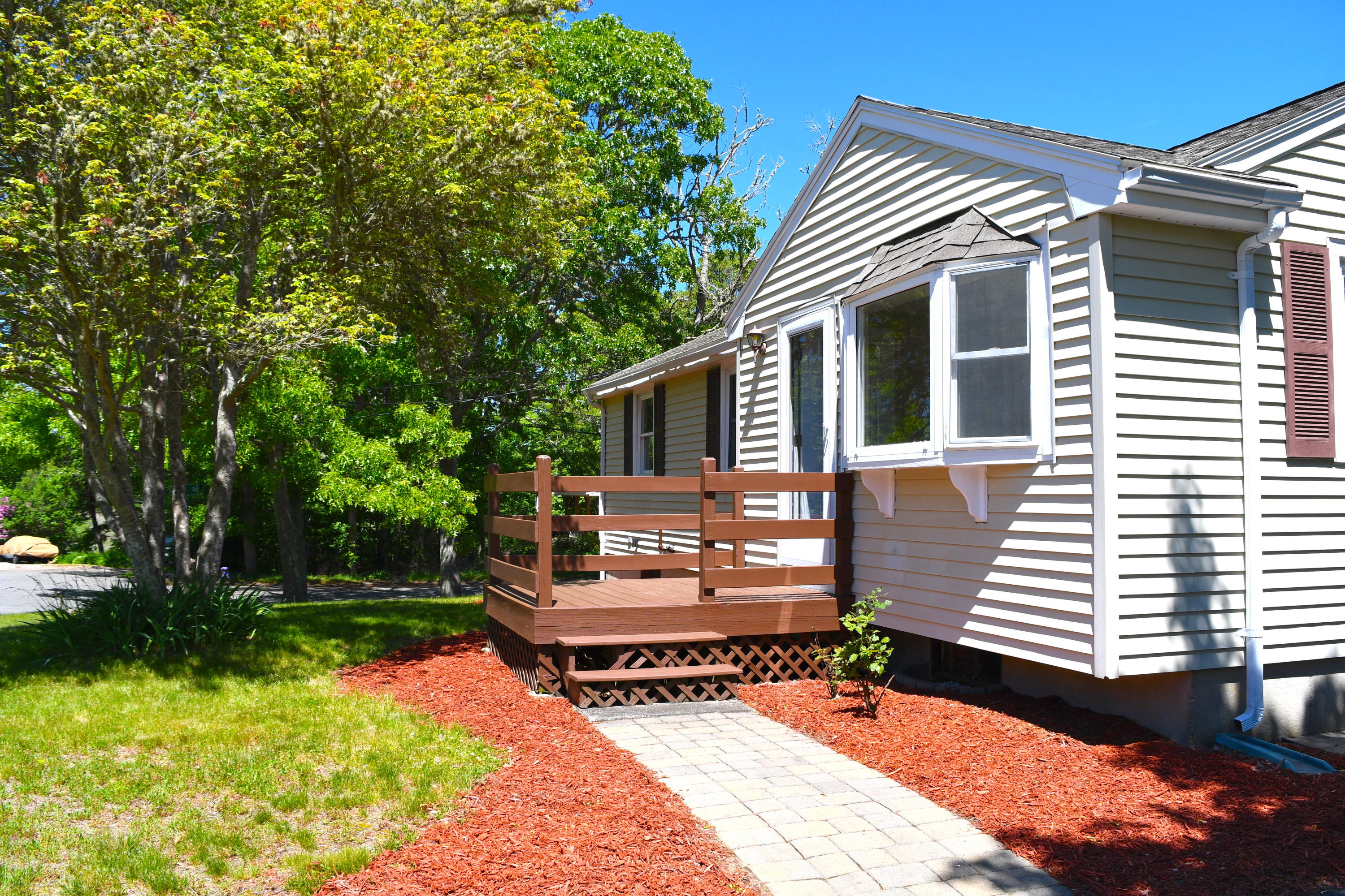 14 Marilyn Road Buzzards Bay, MA 02532 - Photo 6 of 20 a view of a house with backyard and sitting area