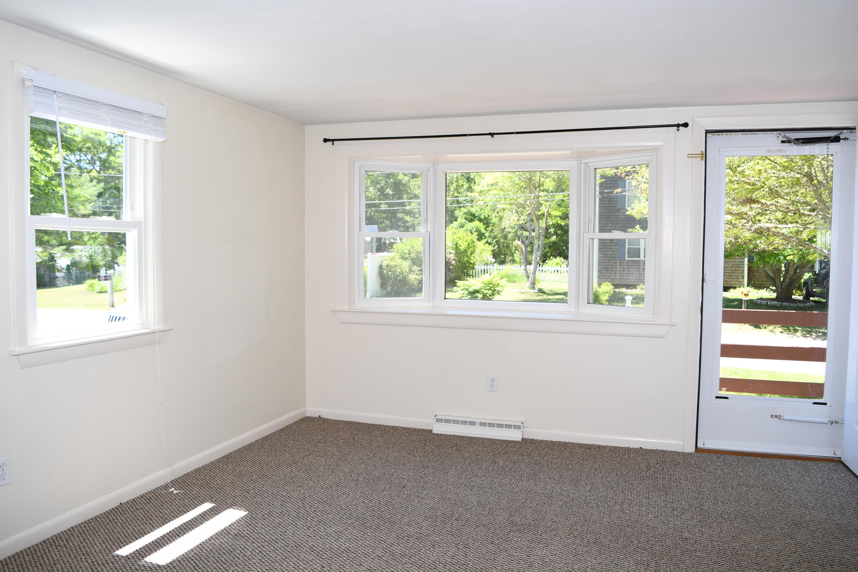 14 Marilyn Road Buzzards Bay, MA 02532 - Photo 8 of 20 a view of an empty room with a window