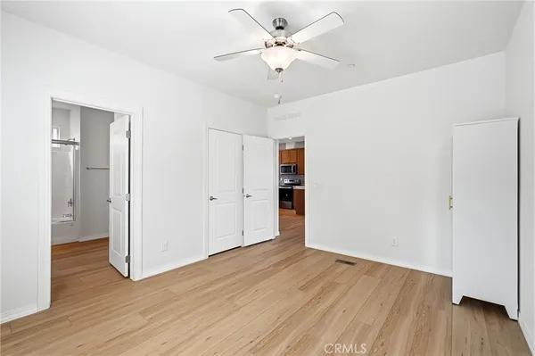 a kitchen with a sink stove and microwave