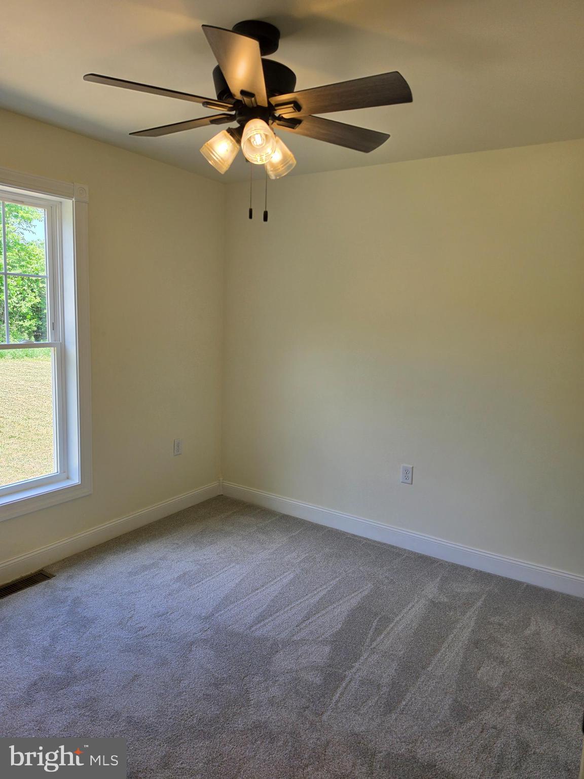 13514 Old Cresaptown Road Southwest Lavale, MD 21502 - Photo 16 of 25 an empty room with a window