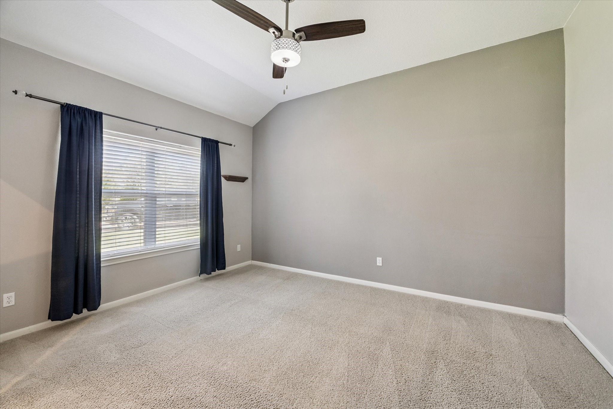 8 Pineway Conroe, TX 77304 - Photo 11 of 20 a view of an empty room with a window