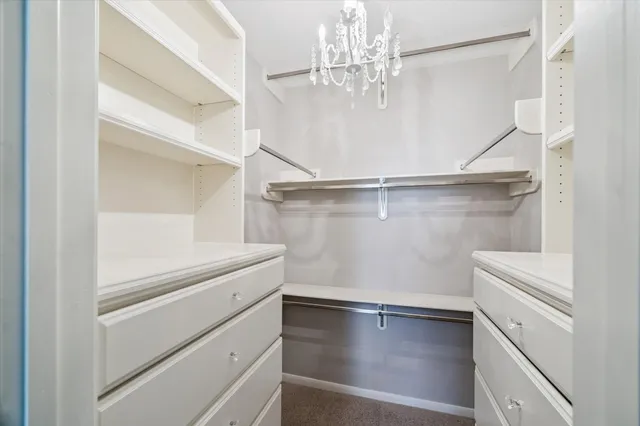 a view of an empty walk in closet