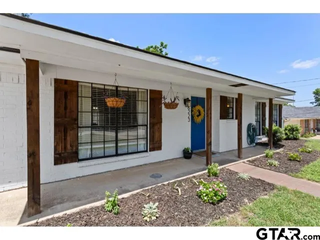 a front view of a house with porch