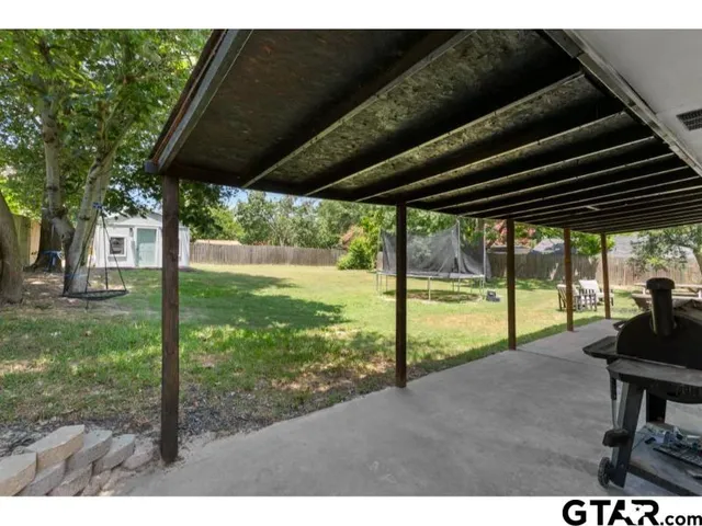 a view of a yard with porch