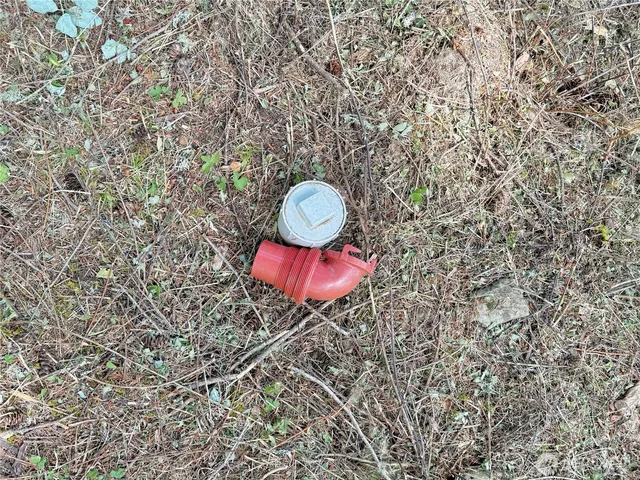 a view of a yard from a balcony
