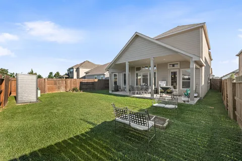 a house view with a outdoor space