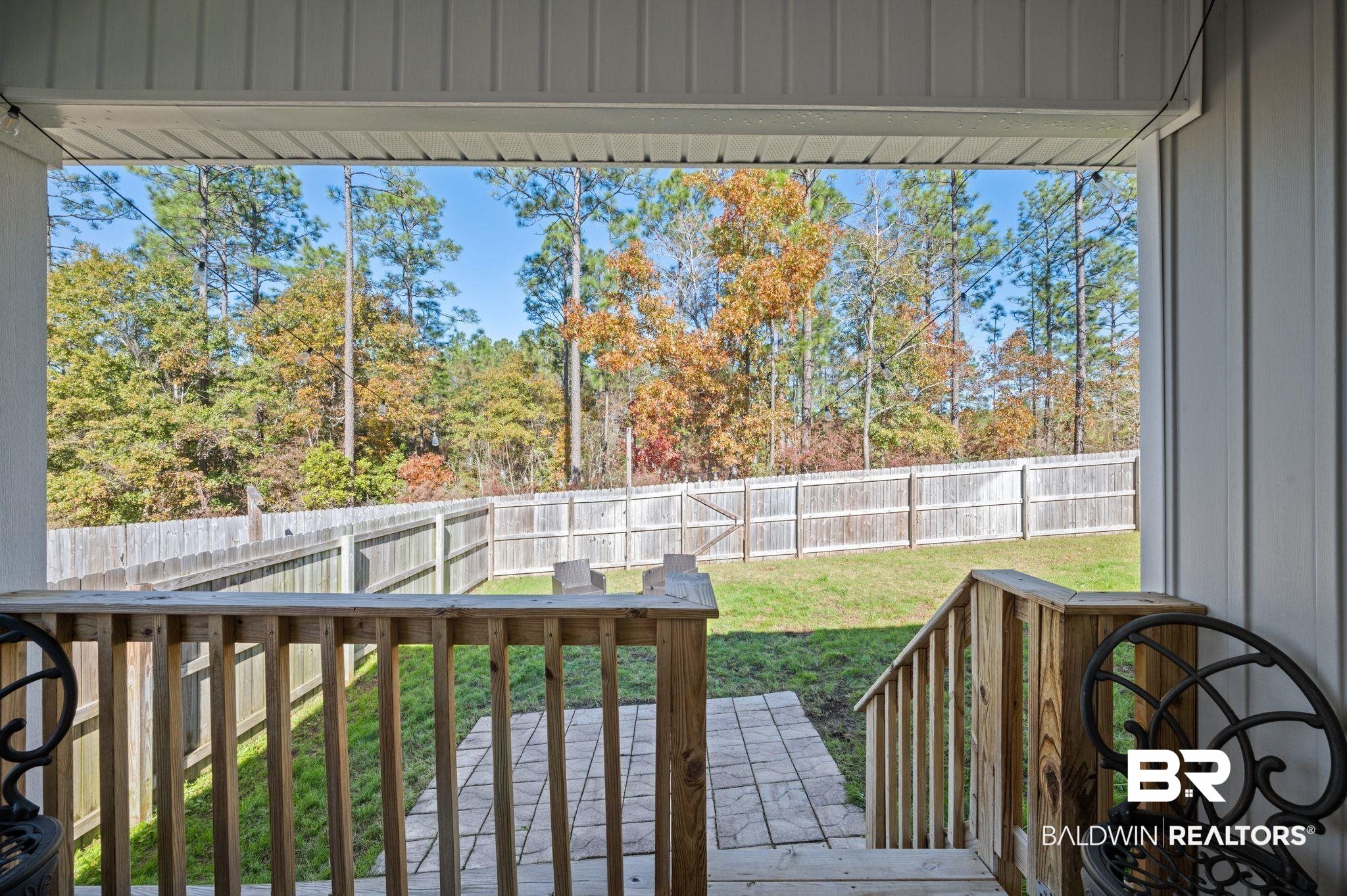 10306 Brodick Loop Spanish Fort, AL 36527 - Photo 27 of 35 Wooden deck with a lawn