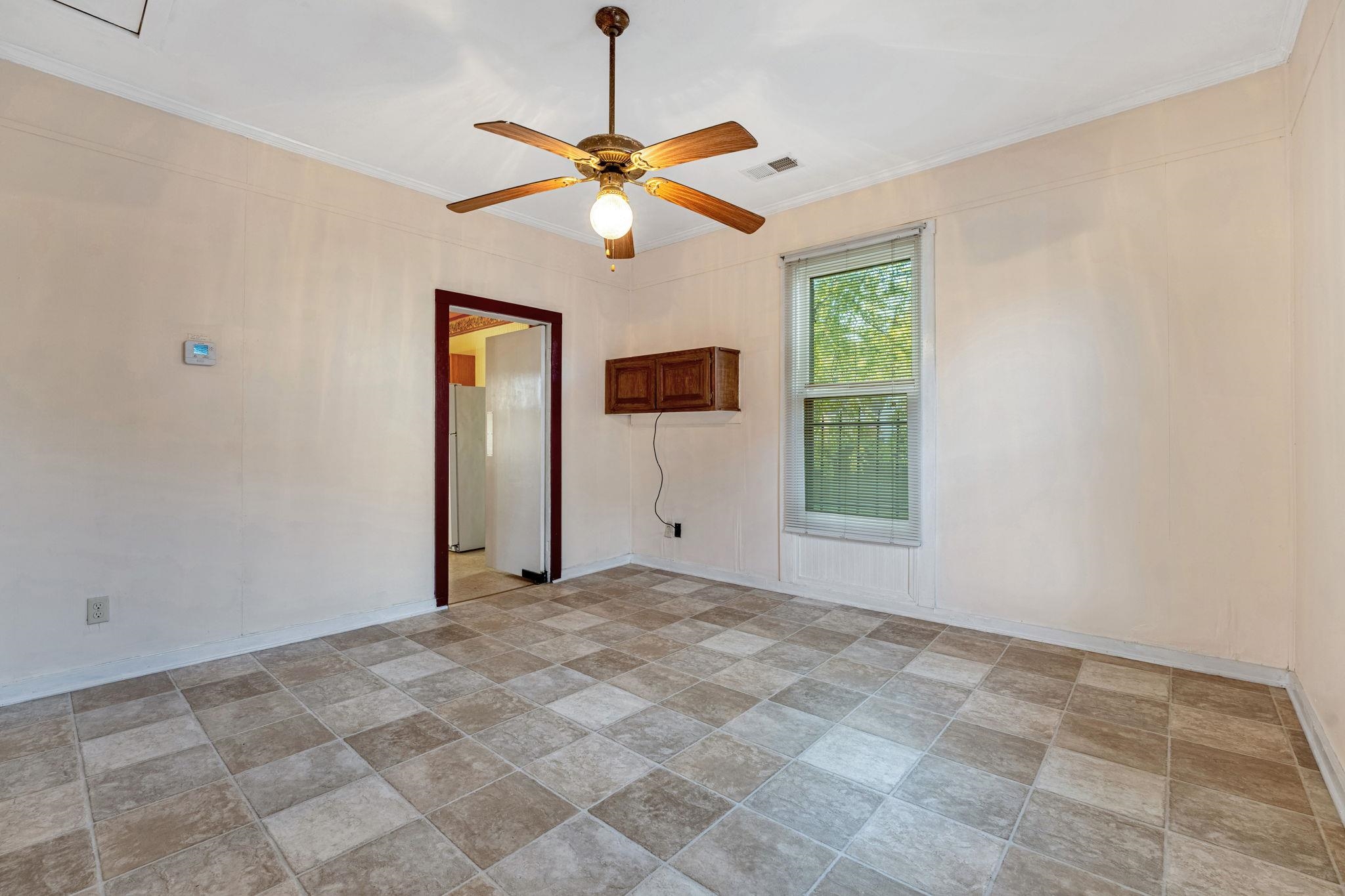 1033 Bruce Street Memphis, TN 38104 - Photo 14 of 19 a view of an empty room with a window