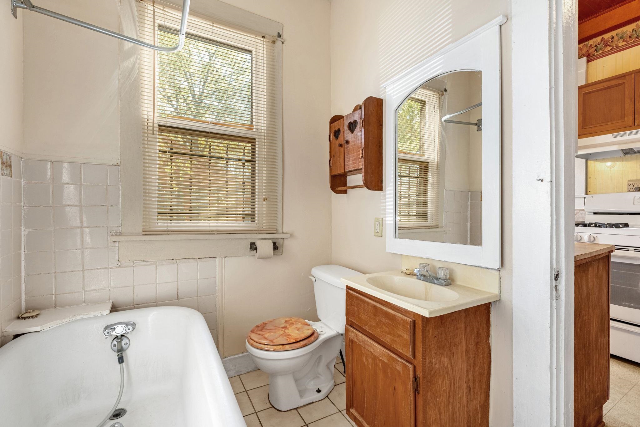 1033 Bruce Street Memphis, TN 38104 - Photo 10 of 19 a bathroom with a sink and a toilet