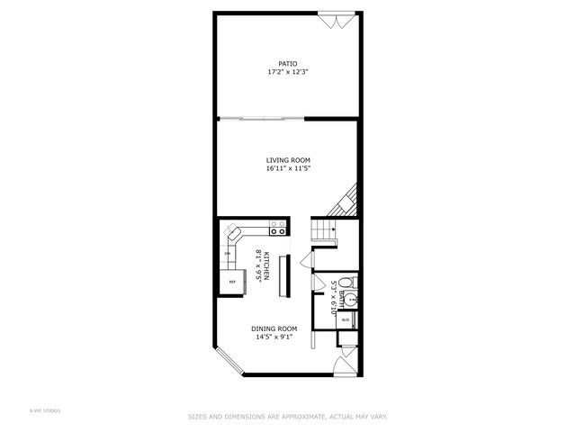 a picture of a bench in front of a wall