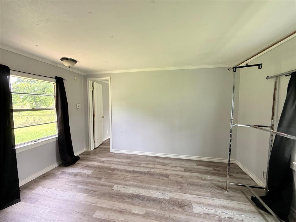 7729 Cutter Drive Frankston, TX 75763 - Photo 17 of 32 a view of an empty room with a window