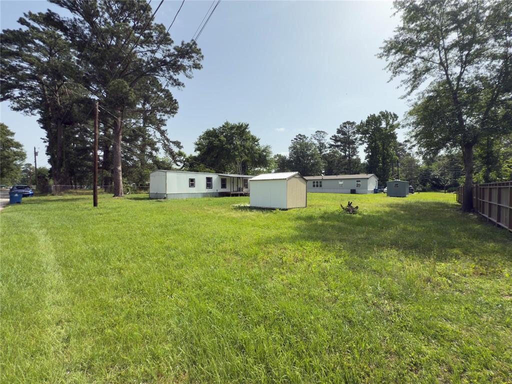7729 Cutter Drive Frankston, TX 75763 - Photo 3 of 32 a swimming pool with wooden fence