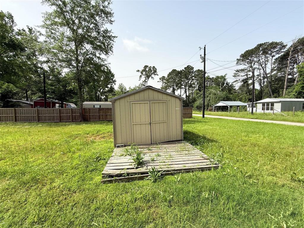 7729 Cutter Drive Frankston, TX 75763 - Photo 4 of 32 a view of a backyard with a garden and entertaining space