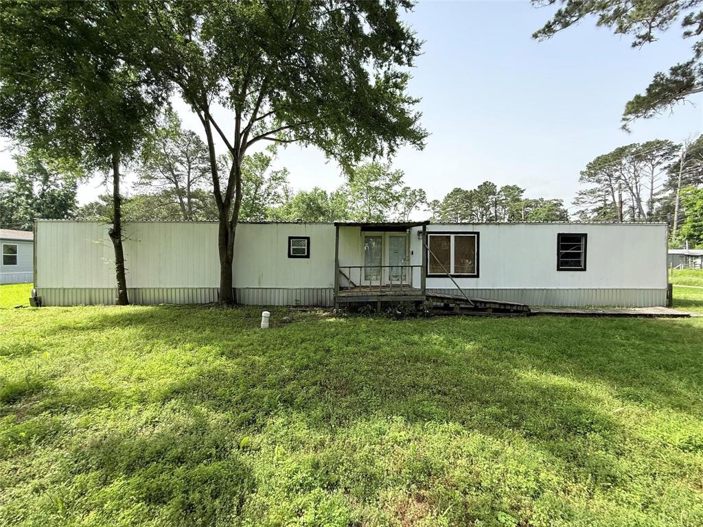 7729 Cutter Drive Frankston, TX 75763 - Photo 5 of 32 a backyard of a house with lots of green space
