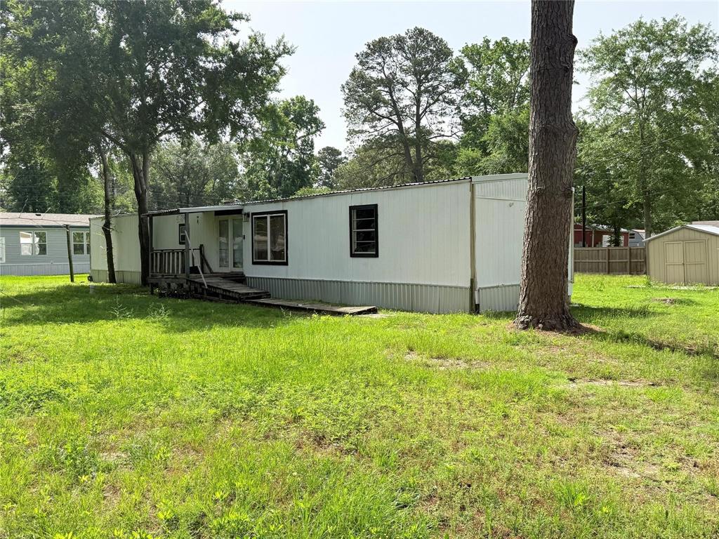 7729 Cutter Drive Frankston, TX 75763 - Photo 9 of 32 a backyard of a house with lots of green space