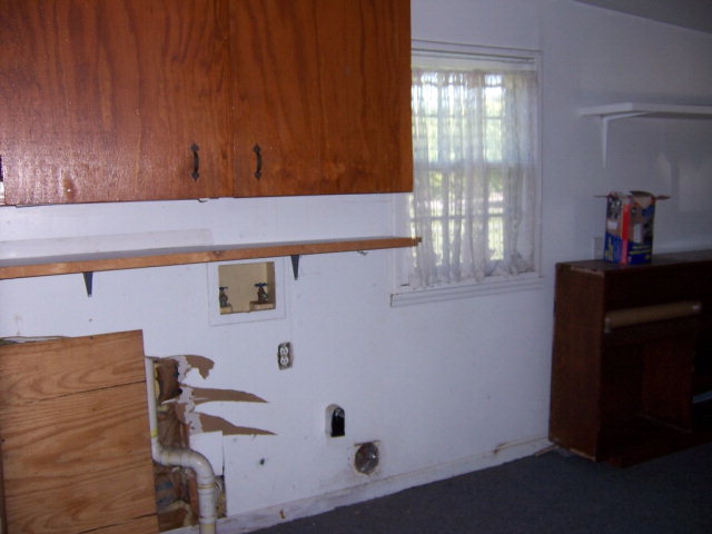 3439 Millerfield Road Macon, GA 31211 - Photo 12 of 15 a bathroom with a sink and a mirror