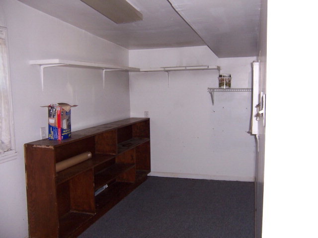 3439 Millerfield Road Macon, GA 31211 - Photo 13 of 15 a room with storage and utility