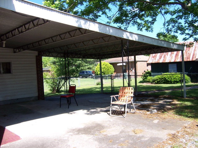 3439 Millerfield Road Macon, GA 31211 - Photo 14 of 15 a chair and table in the garden