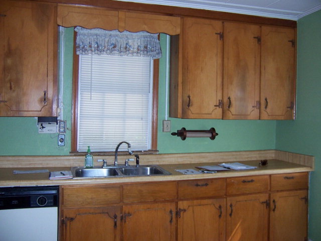 3439 Millerfield Road Macon, GA 31211 - Photo 4 of 15 a bathroom with a sink and a mirror