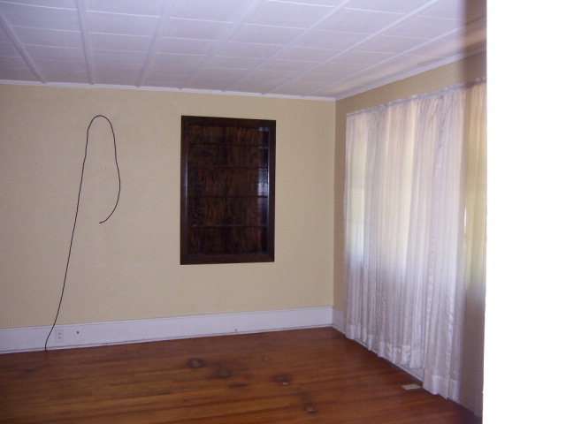 3439 Millerfield Road Macon, GA 31211 - Photo 10 of 15 a view of a livingroom with wooden floor