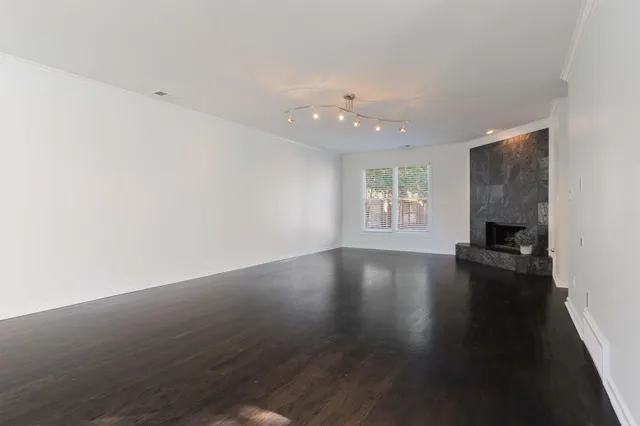 a view of livingroom with hardwood floor and a window