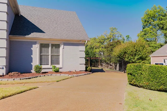 a view of a backyard of a house
