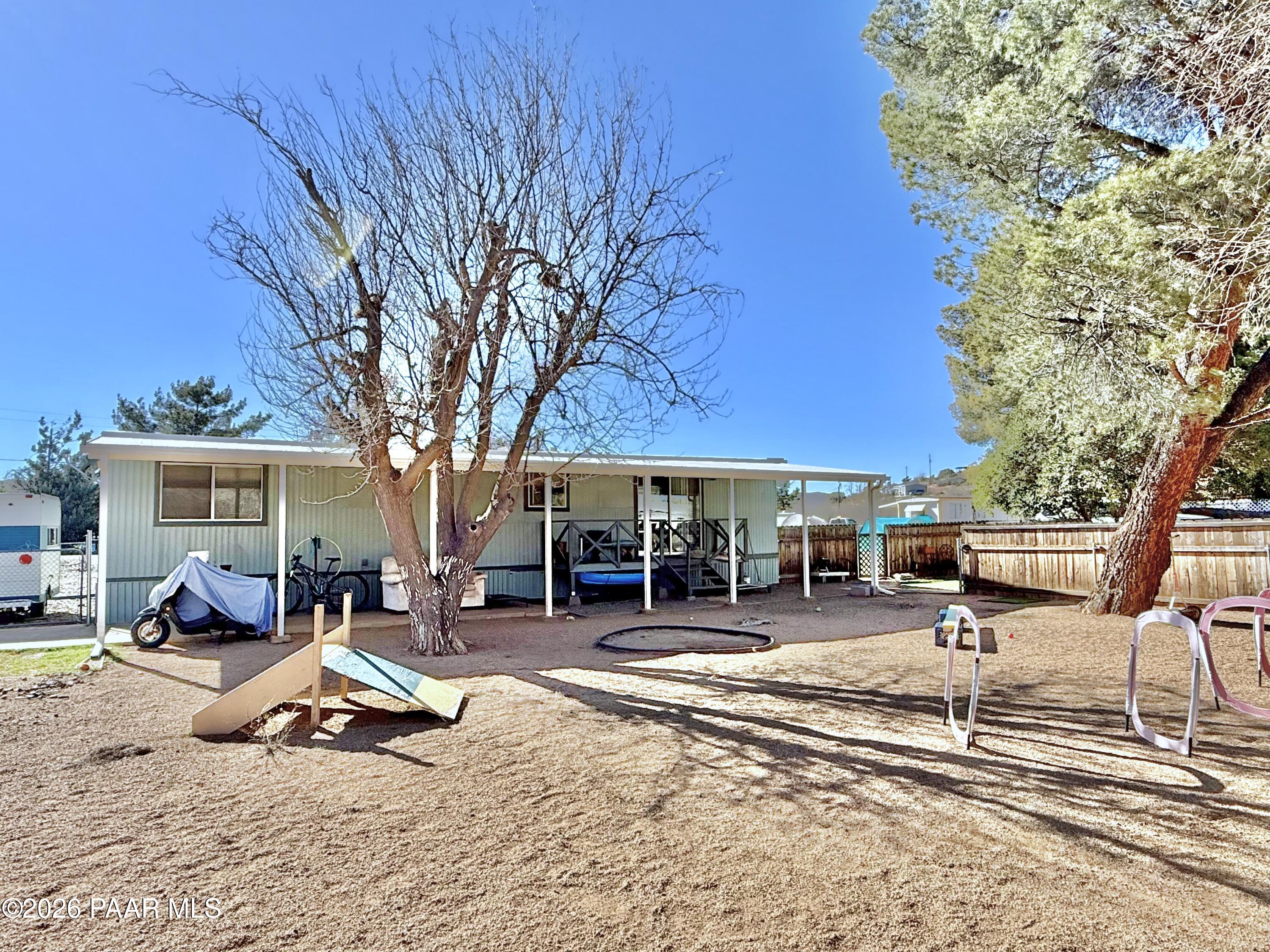 20817 East Butterfield Road Mayer, AZ 86333 - Photo 11 of 24 a view of a outdoor space with a patio