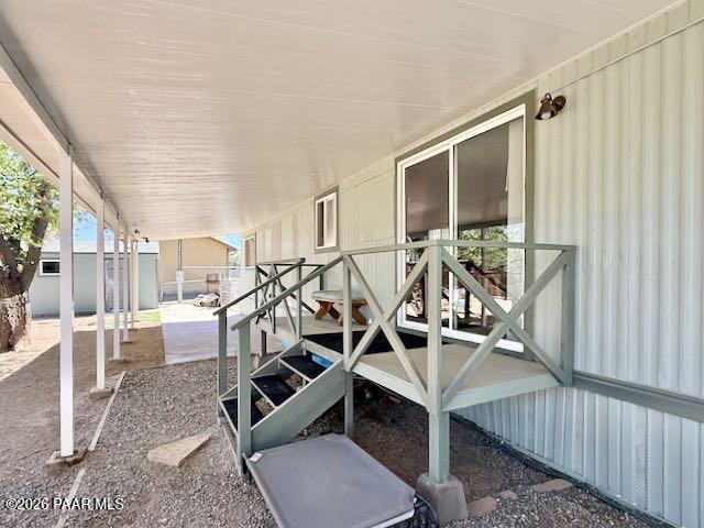 20817 East Butterfield Road Mayer, AZ 86333 - Photo 18 of 47 a view of a chairs and table in the balcony